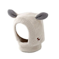 Pink knitted animal ear dog hood with cream inner ears and ribbed trim.